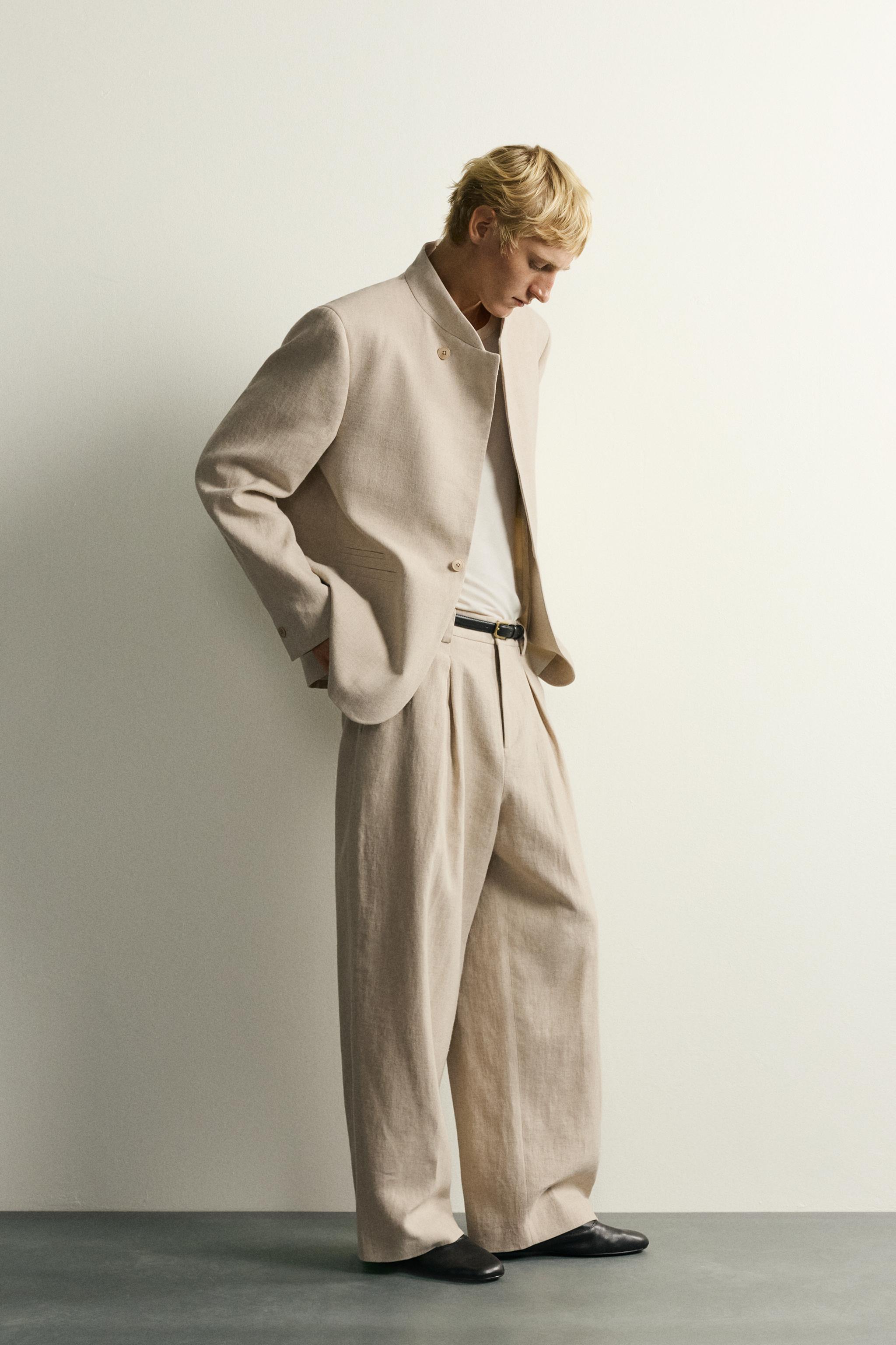 RELAXED FIT PLEATED SUIT PANTS